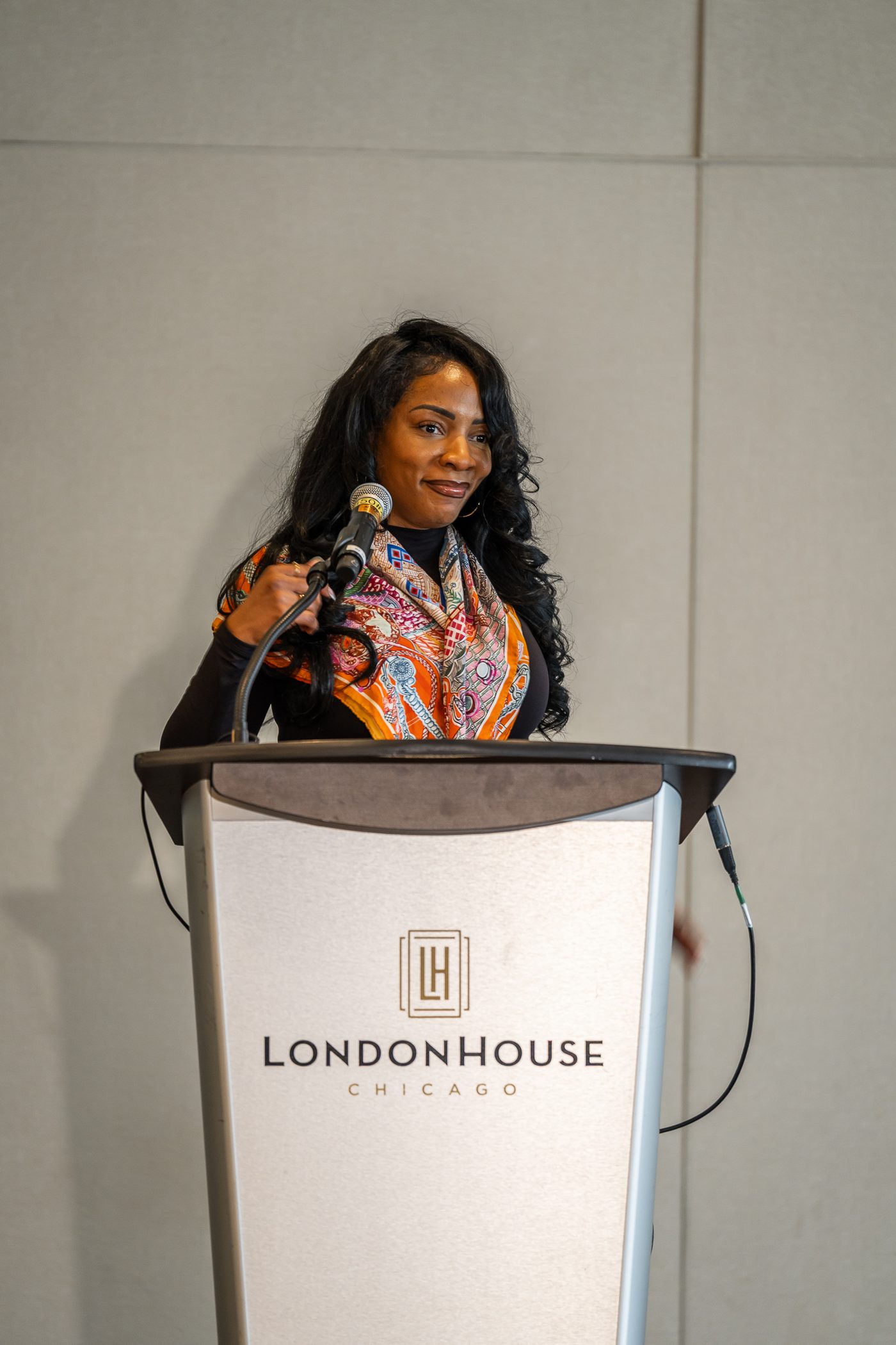 Shonda Williams presenting at a company event